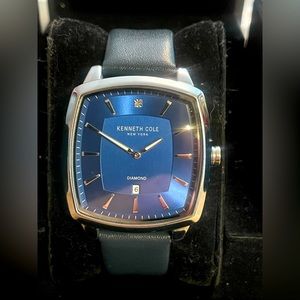 Kenneth Cole New York men’s dress watch. Diamond series w/ real diamond.